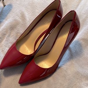 Brand new size 11 Michael Kors 4” red high heels